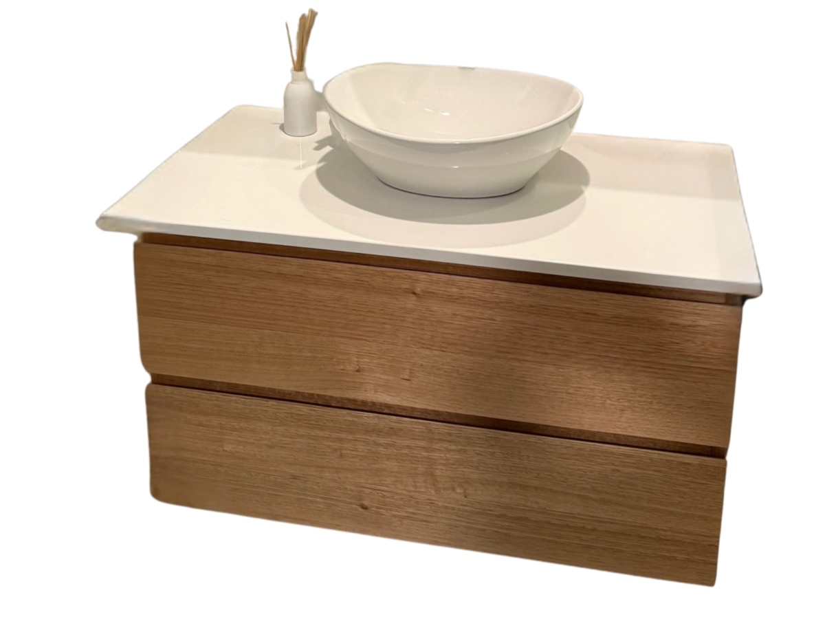 Custom timber vanity unit with a white basin, featuring a sleek design and natural wood finish, showcasing Coastal Design Furniture's craftsmanship and customization options.