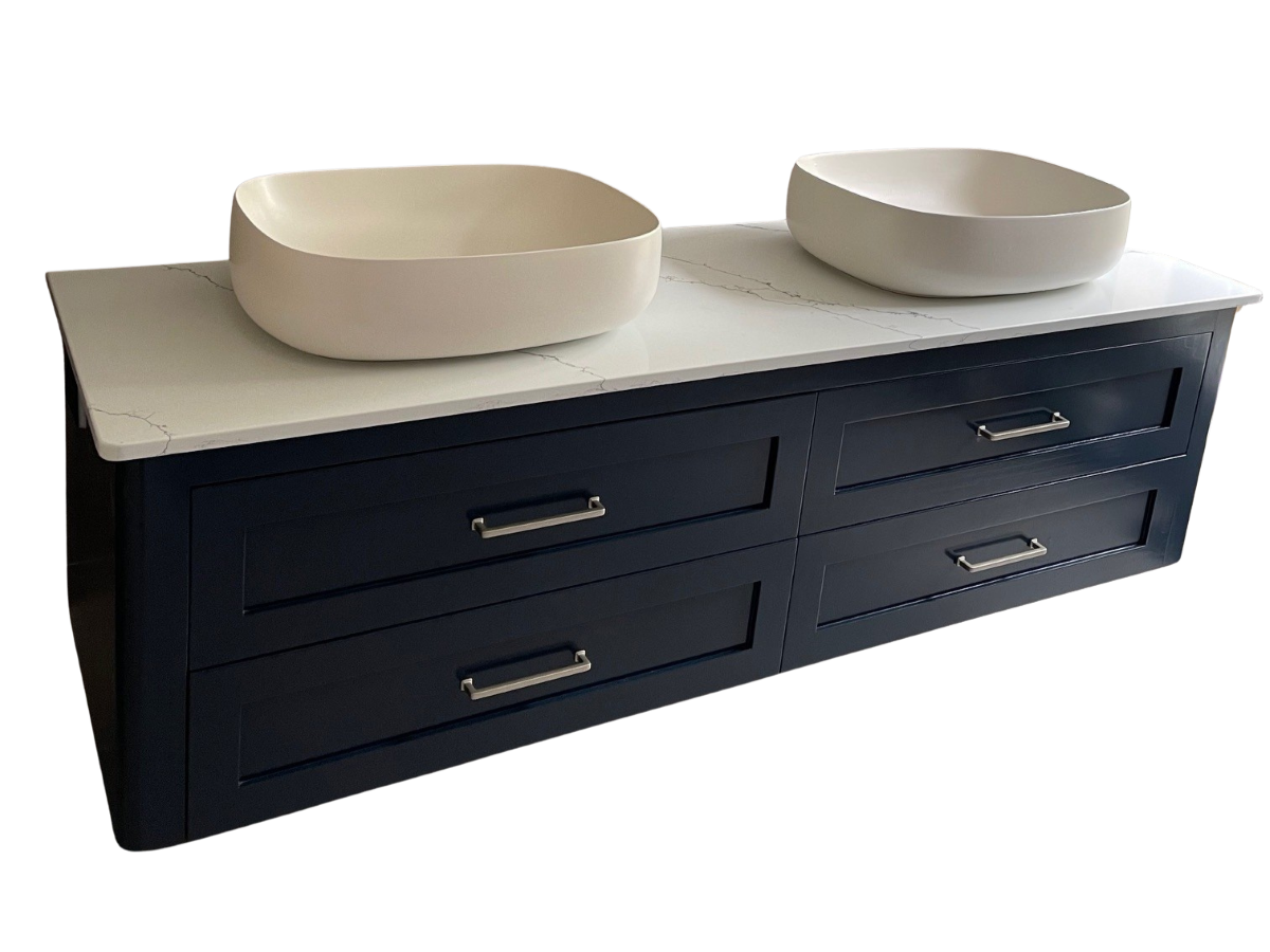 Custom timber vanity unit with two white basin sinks, featuring a sleek marble countertop and multiple drawers, showcasing craftsmanship and design options for personalized home decor.