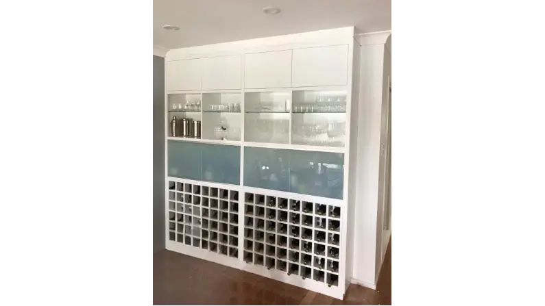 Custom timber wine rack with frosted glass, handcrafted in Central Coast NSW, enhancing coastal home elegance.